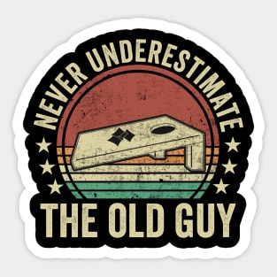 Never Underestimate The Old Guy Cornhole Player Sticker